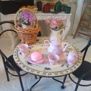 Pink Tea Set with Floral Design